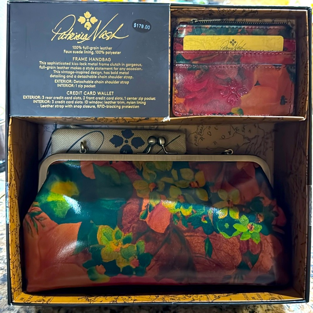 New in Box Patricia Nash frame handbag with matching credit card wallet.